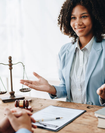 Portrait of african american woman lawyer studying lawsuit a for Portrait of african american woman lawyer studying lawsuit a for a discussing client documents law data before going to court